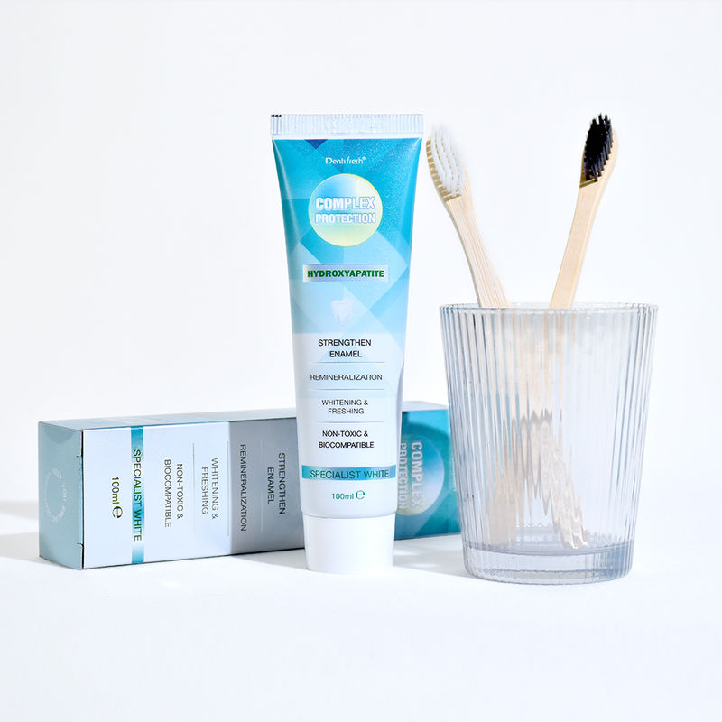 Умеренный эффект от отбеливания зубов Отбеливающие зубные пасты с зубной щеткой два раза в день и ингредиенты натрия фитат