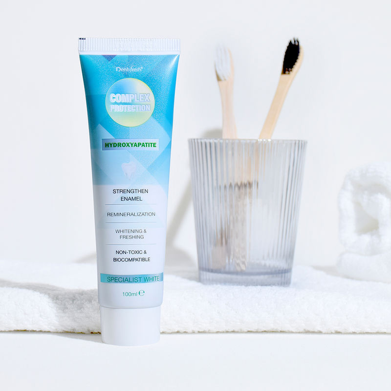 Умеренный эффект от отбеливания зубов Отбеливающие зубные пасты с зубной щеткой два раза в день и ингредиенты натрия фитат